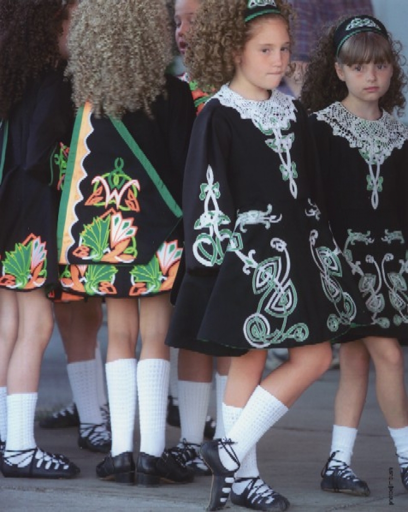 Girl in Two Styles of School Costume